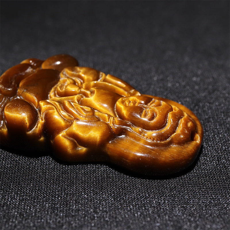 タイガーアイ＜中国産＞　観音菩薩　約23～25×37～40mm　彫刻プレート　穴あり [co-g2825]
