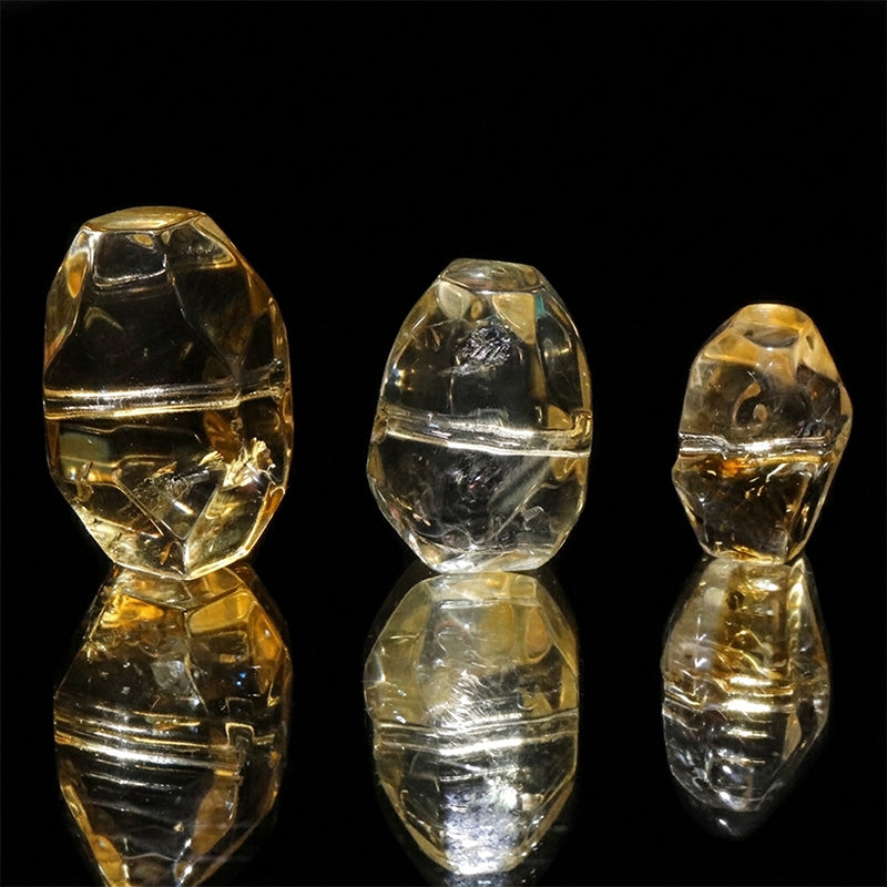 シトリン＜ブラジル産＞　穴あり　約横7～12×縦10～17mm　天然石パーツ　ランダム発送　 [co-g3392]