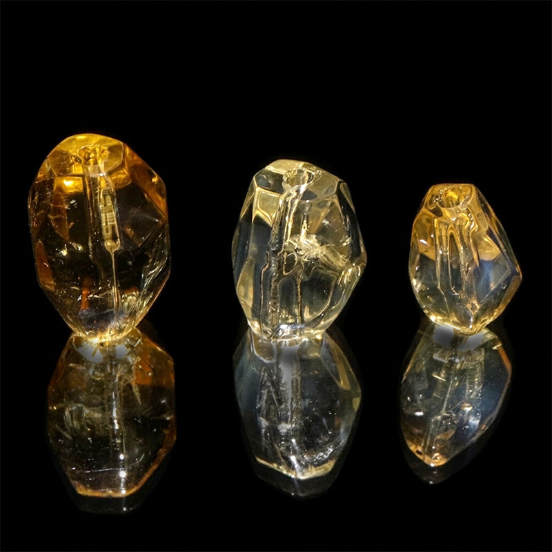 シトリン＜ブラジル産＞　穴あり　約横7～12×縦10～17mm　天然石パーツ　ランダム発送　 [co-g3392]