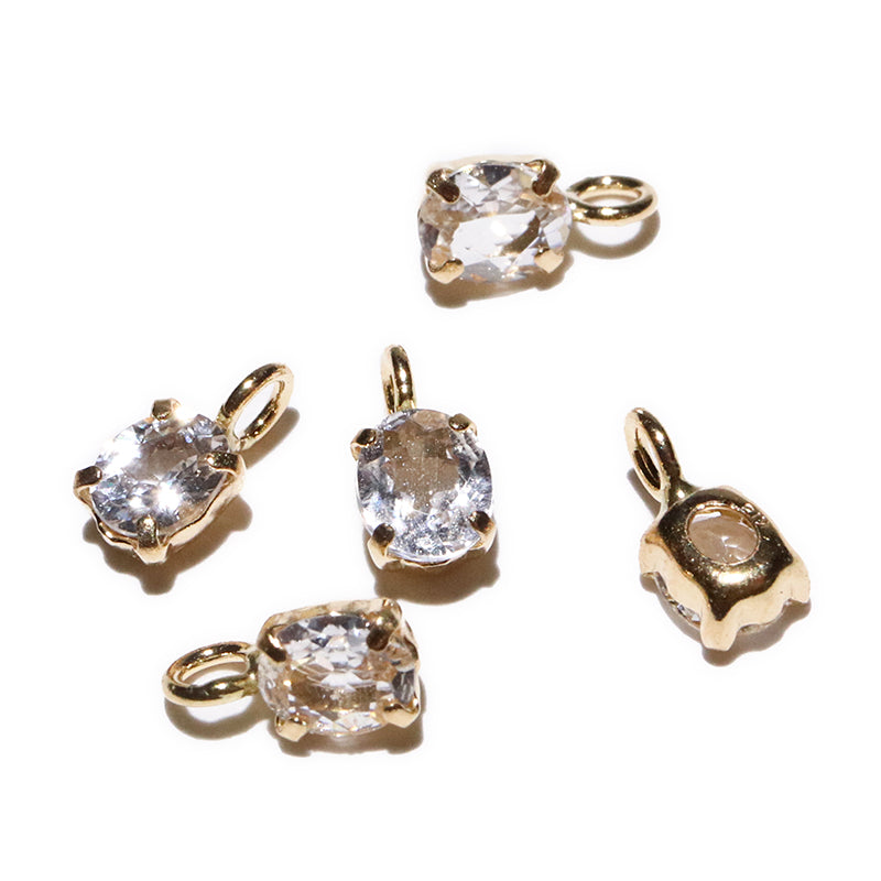 フェナカイト＜ロシア産＞　オーバルカット　約3×4mm　K18　ゴールド　ペンダントトップ [co-g2915]