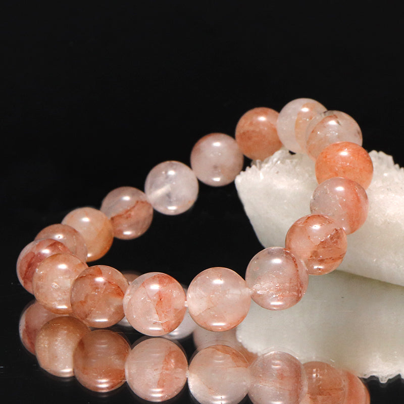 ブレス　マニカラン水晶＜ヒマラヤ産＞　AAランク　薄ピンク　丸  [br-g0184]