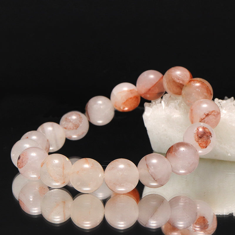 ブレス　マニカラン水晶＜ヒマラヤ産＞　AAAランク　薄ピンク　丸 [br-g0181]