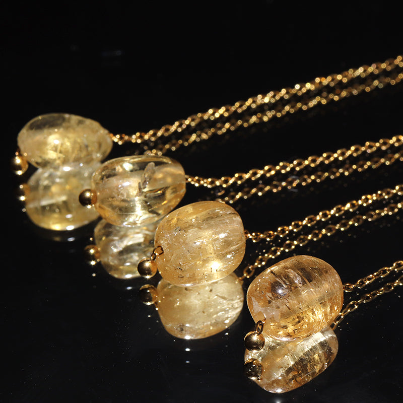インペリアルトパーズ＜ブラジル産＞　タンブル　アメリカンピアス　ステンレス製　ゴールド　ランダム発送 [co-g3046]
