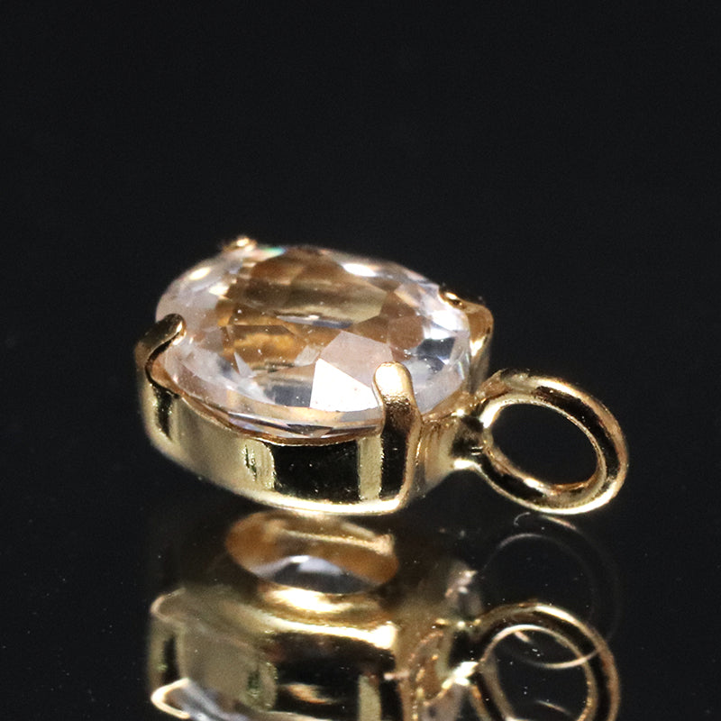 ペンダントトップ　フェナカイト＜ロシア産＞　オーバルカット　約4×5mm　K18　ゴールド　[co-g1553]