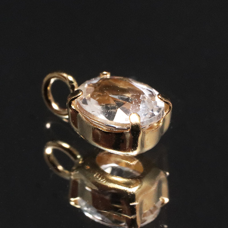 ペンダントトップ　フェナカイト＜ロシア産＞　オーバルカット　約4×5mm　K18　ゴールド　[co-g1553]